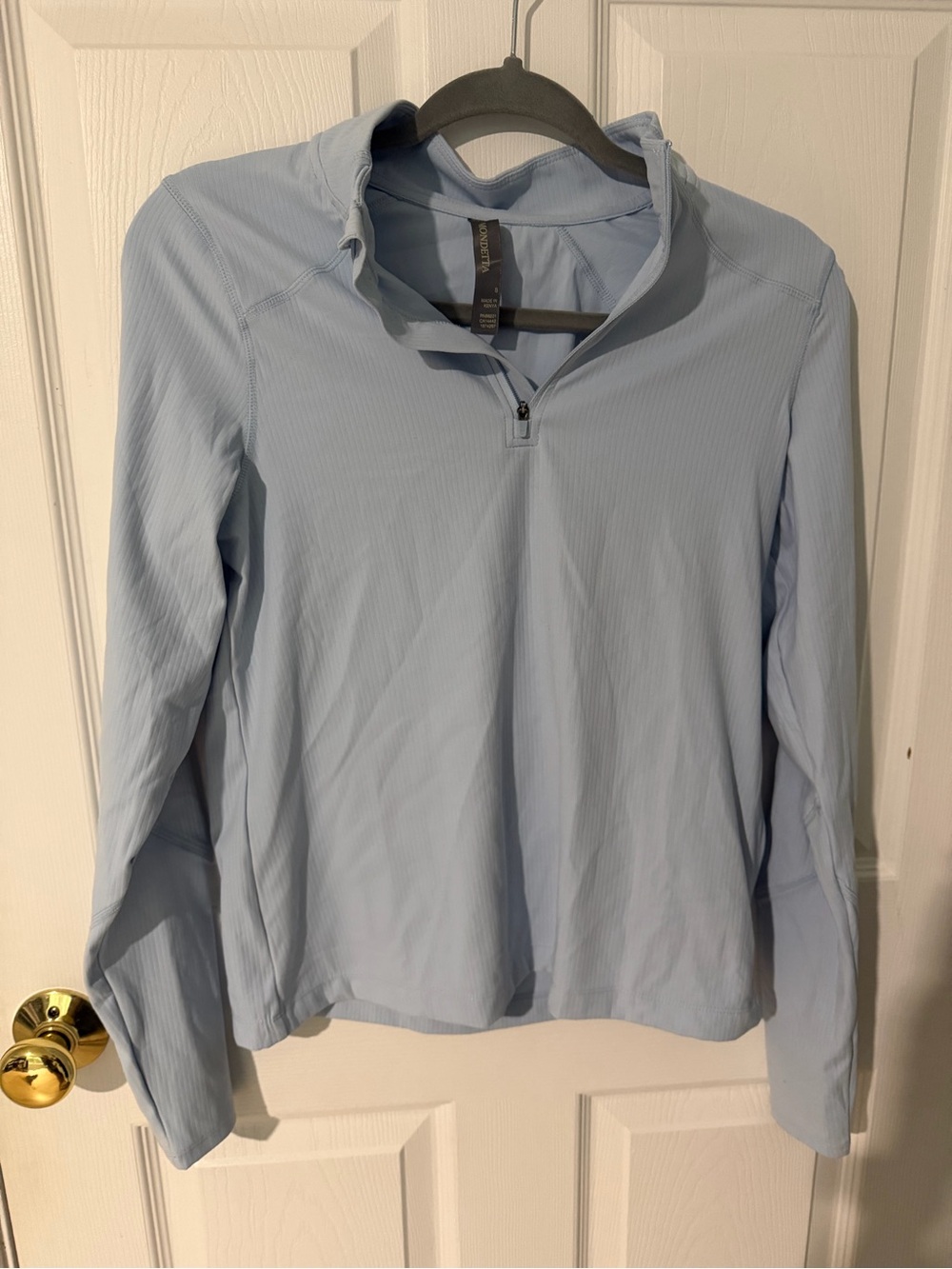 Light Blue woman’s Quarter-Zip Long Sleeve Shirt
